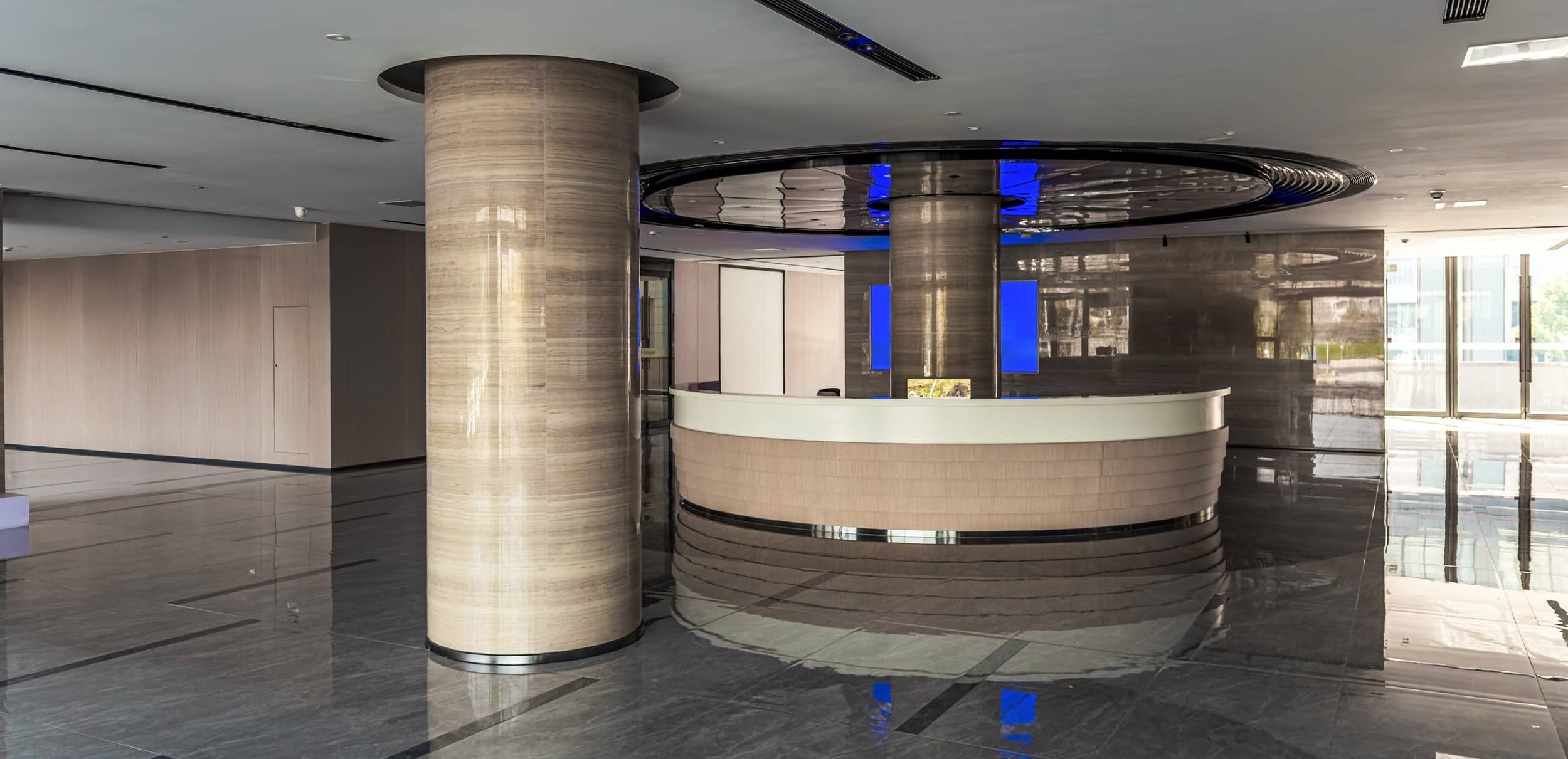 Polished floor in a corporate building lobby.