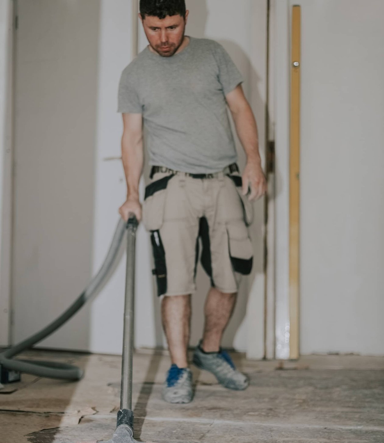 Specialist cleaner removing construction dust after a fit-out.